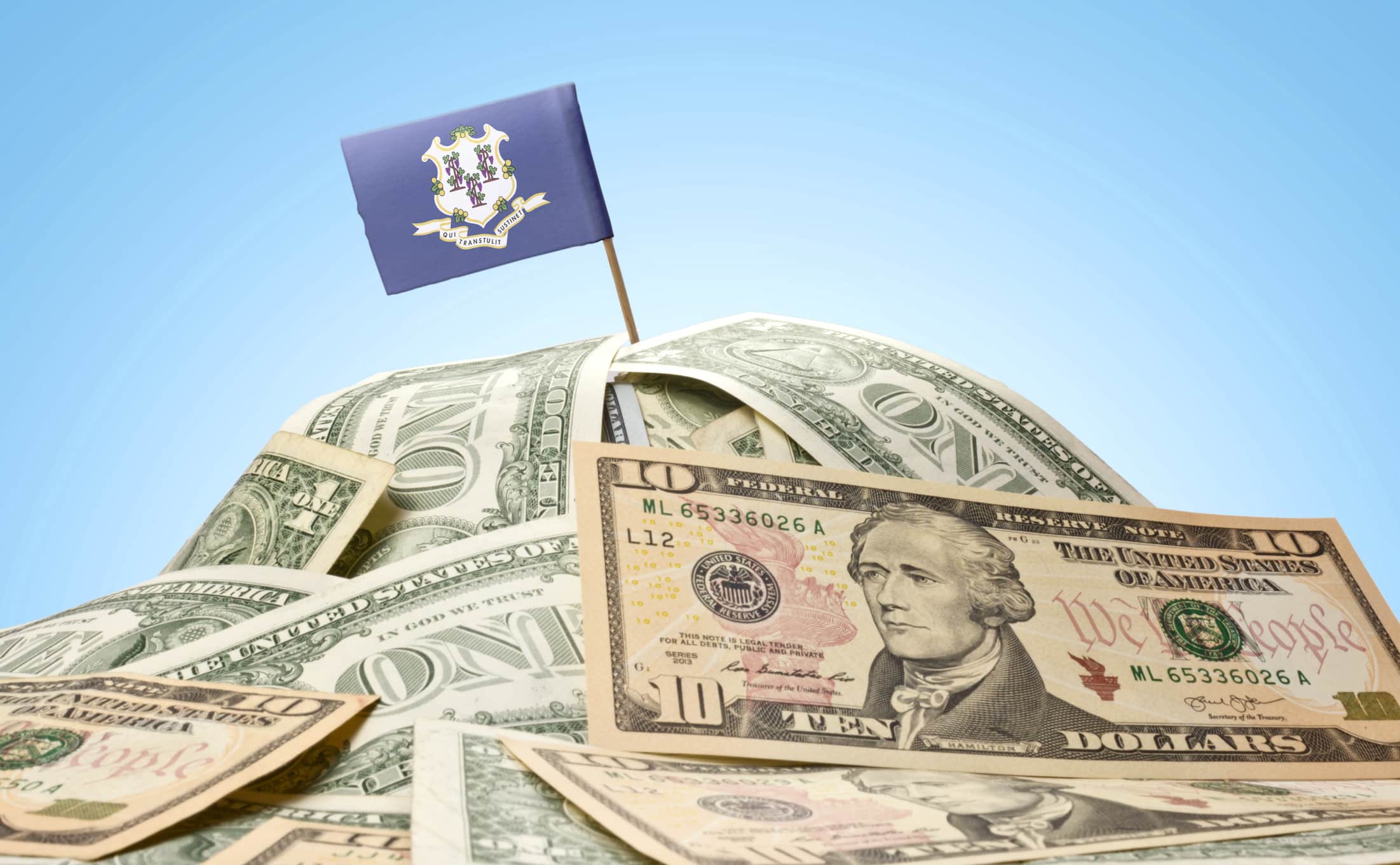 Flag of Connecticut sticking in american banknotes.(series)